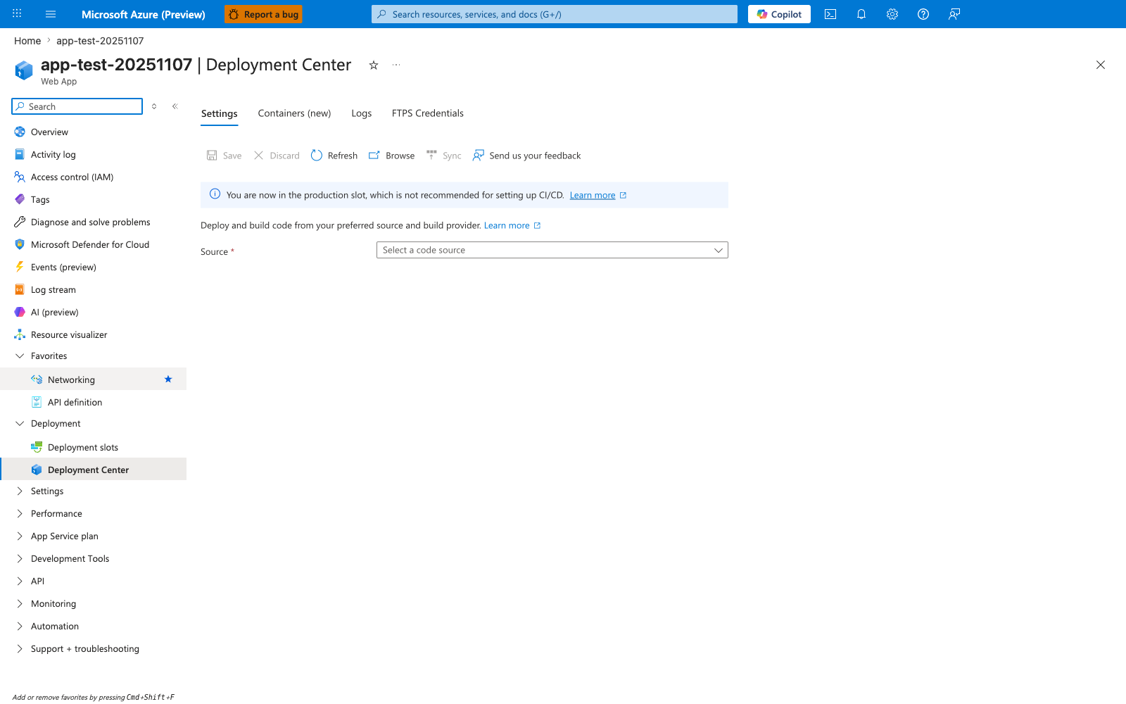 Deployment Center blade for a Web App with four tabs — Settings (active), Containers (new), Logs, and FTPS Credentials. The command bar shows Save, Discard, Refresh, Browse, Sync, and Send us your feedback actions. A prominent blue info banner reads "You are now in the production slot, which is not recommended for setting up CI/CD" with a "Learn more" link. The body explains "Deploy and build code from your preferred source and build provider" with another Learn more link, followed by a required Source field whose dropdown shows the placeholder text "Select a code source" and is currently empty. The left navigation shows the Deployment group expanded with Deployment slots and Deployment Center (active) entries.