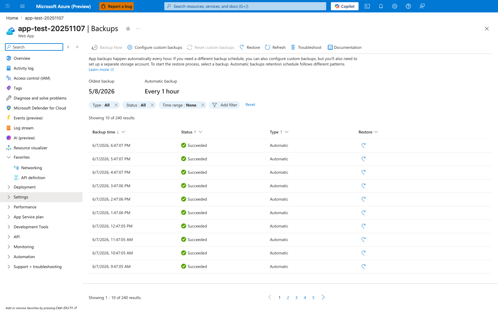 Backups blade for the Web App with the command bar offering Backup Now (disabled), Configure custom backups, Reset custom backups (disabled), Restore, Refresh, Troubleshoot, and Documentation actions. An info banner reads "App backups happen automatically every hour. If you need a different backup schedule, you can also configure custom backups, but you'll also need to set up a separate storage account. To start the restore process, select a backup. Automatic backups retention schedule follows different patterns." with a Learn more link. Two summary tiles show Oldest backup "5/8/2026" and Automatic backup "Every 1 hour". A filter row shows three removable chips (Type : All, Status : All, Time range : None), an Add filter button, and a Reset link, followed by "Showing 10 of 240 results". The backup table has columns Backup time (sorted descending), Status, Type, and Restore. Ten rows show hourly backups from 6/7/2026 9:47:05 AM to 6/7/2026 6:47:07 PM, each with Status "Succeeded" (green checkmark), Type "Automatic", and an individual Restore action icon. Pagination at the bottom reads "Showing 1 - 10 of 240 results" with page numbers 1 through 5.