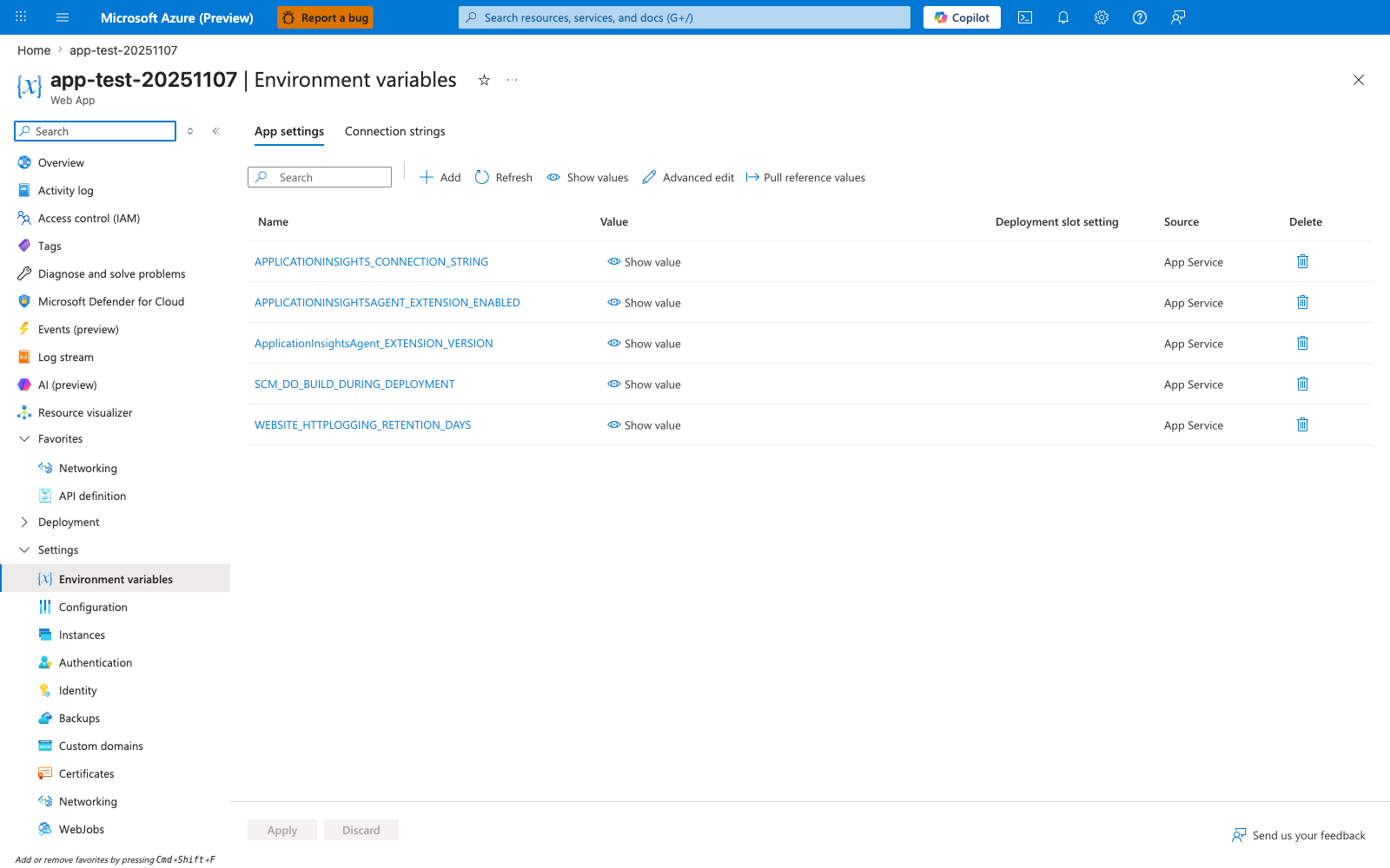 Azure Portal Environment variables blade for app-test-20251107 Web App with the App settings tab selected (Connection strings tab adjacent). The toolbar shows a search box plus the actions plus Add, Refresh, Show values, Advanced edit, and Pull reference values. The settings table has columns Name, Value, Deployment slot setting, Source, and Delete and lists five App Service-sourced rows: APPLICATIONINSIGHTS_CONNECTION_STRING, APPLICATIONINSIGHTSAGENT_EXTENSION_ENABLED, ApplicationInsightsAgent_EXTENSION_VERSION, SCM_DO_BUILD_DURING_DEPLOYMENT, and WEBSITE_HTTPLOGGING_RETENTION_DAYS, each with a Show value link and Source App Service. The left navigation expands Settings with Environment variables highlighted, alongside Configuration, Instances, Authentication, Identity, Backups, Custom domains, Certificates, Networking, and WebJobs; Apply and Discard buttons are disabled at the bottom.