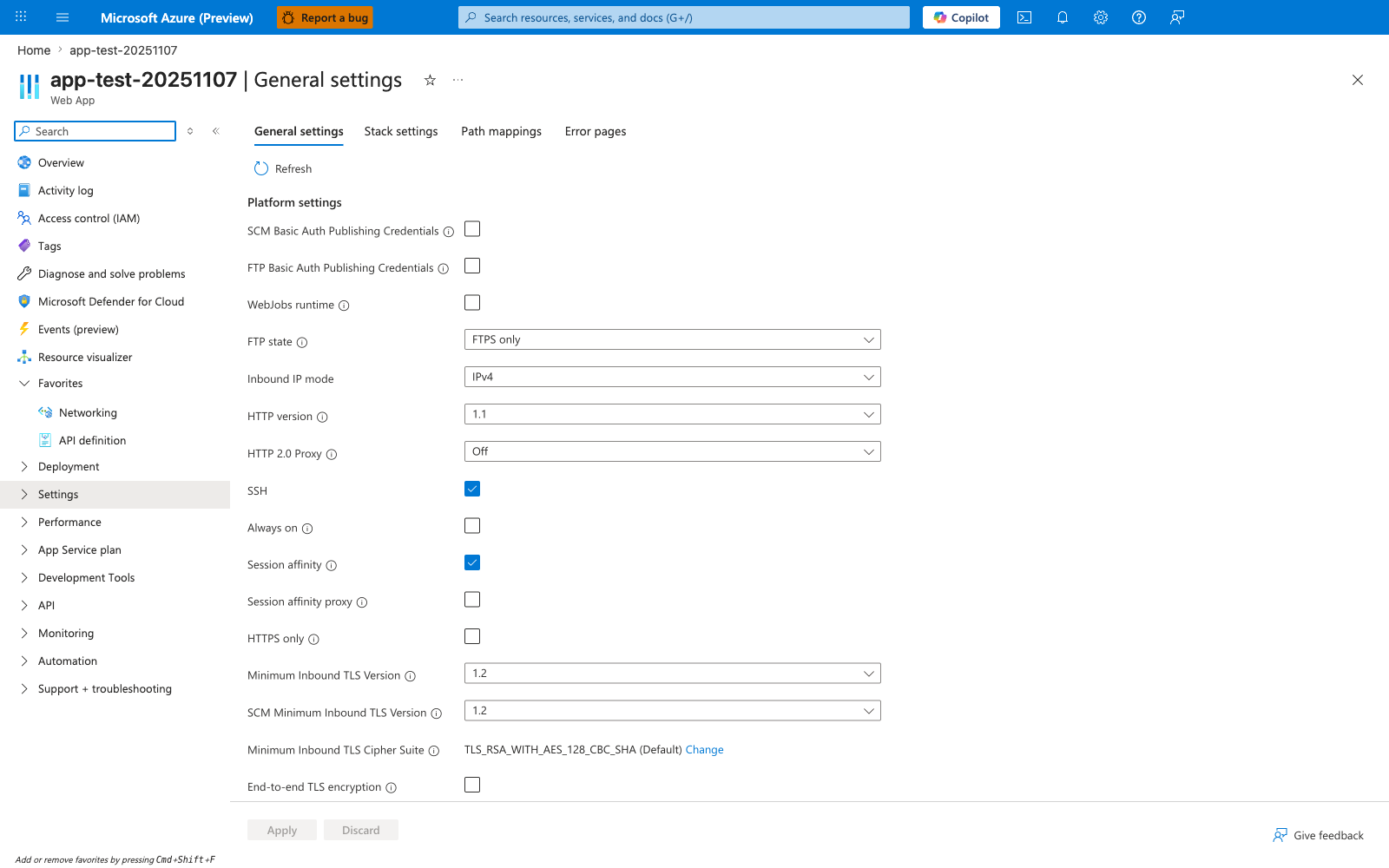 Azure portal Configuration > General settings blade for app-test-20251107 with tabs General settings (active), Stack settings, Path mappings, Error pages; left service navigation showing Overview, Activity log, Access control (IAM), Tags, Diagnose and solve problems, Microsoft Defender for Cloud, Events (preview), Resource visualizer, Favorites (with Networking and API definition pinned), and a collapsed Settings group; a Platform settings panel listing SCM Basic Auth Publishing Credentials, FTP Basic Auth Publishing Credentials, WebJobs runtime, FTP state (FTPS only), Inbound IP mode (IPv4), HTTP version (1.1), HTTP 2.0 Proxy (Off), SSH (enabled), Always on (toggle disabled), Session affinity (enabled), Session affinity proxy (disabled), HTTPS only (disabled), Minimum Inbound TLS Version (1.2), SCM Minimum Inbound TLS Version (1.2), Minimum Inbound TLS Cipher Suite (TLS_RSA_WITH_AES_128_CBC_SHA, Default), and End-to-end TLS encryption (disabled); Apply and Discard action buttons at the bottom.